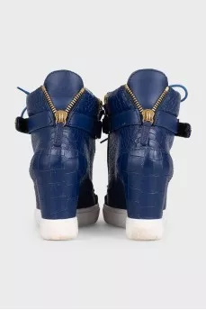 Leather wedge sneakers with embossed detailing