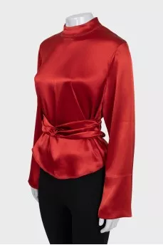 Red satin blouse with a belt
