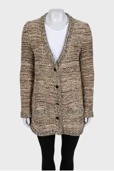 Knitted cardigan with buttons and fringe