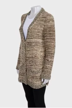 Knitted cardigan with buttons and fringe