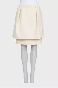 White suit with a skirt and a fitted jacket