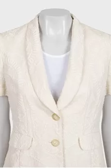 White suit with a skirt and a fitted jacket
