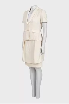 White suit with a skirt and a fitted jacket