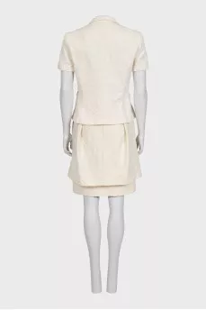 White suit with a skirt and a fitted jacket