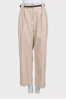 Beige straight trousers with a belt