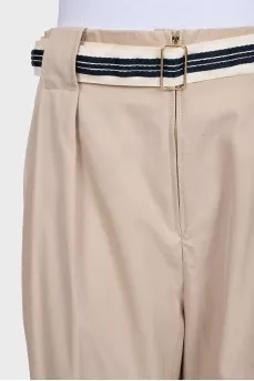Beige straight trousers with a belt