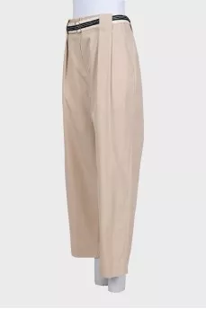 Beige straight trousers with a belt