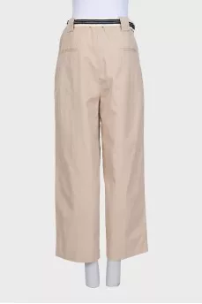 Beige straight trousers with a belt