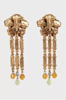 Flower-shaped clip-on earrings in gold color