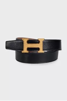 Double-sided black belt with gold buckle