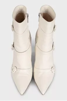 White ankle boots with leather straps