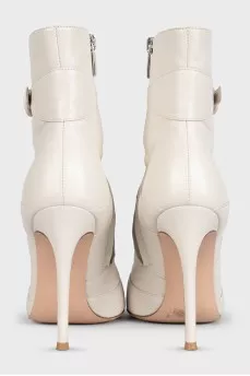 White ankle boots with leather straps