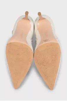 White ankle boots with leather straps