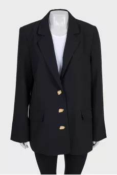 Black jacket with shaped buttons