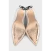 White pumps decorated with a bow