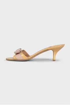 Patent leather heel mules with a bow