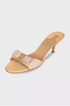 Patent leather heel mules with a bow