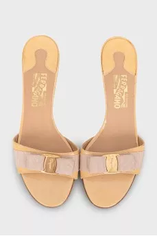 Patent leather heel mules with a bow