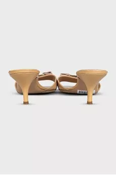 Patent leather heel mules with a bow