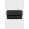 Quilted leather wallet with logo
