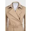 Fitted coat with a belt