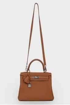 Kelly 25 Bag в коже Clemence карамельного цвета