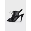 Black lace-up sandals with mesh