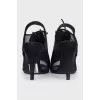 Black lace-up sandals with mesh