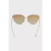 Cat eye sunglasses with gold frames