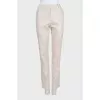 Beige suit with fringe