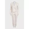 Beige suit with fringe