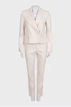 Beige suit with fringe