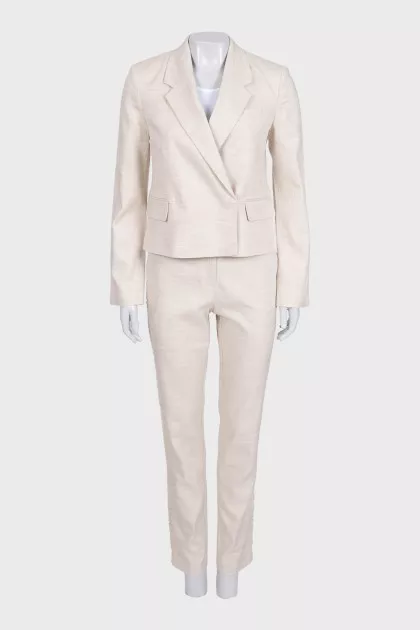 Beige suit with fringe