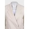 Beige suit with fringe