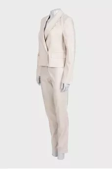 Beige suit with fringe