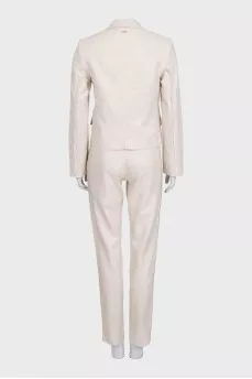 Beige suit with fringe