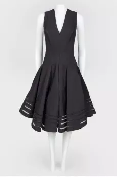Black dress with flared skirt