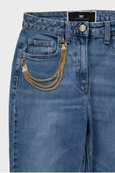 Skinny blue jeans with a gold chain