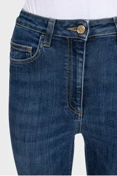 Slim-fit blue jeans with a high waist