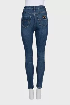 Slim-fit blue jeans with a high waist