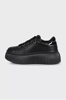 Black leather sneakers with a chunky sole