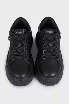 Black leather sneakers with a chunky sole