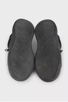 Black leather sneakers with a chunky sole
