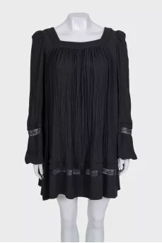 Black pleated dress with long sleeves