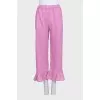 Pink suit with ruffles