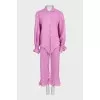 Pink suit with ruffles