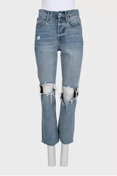 Blue ripped jeans with logo