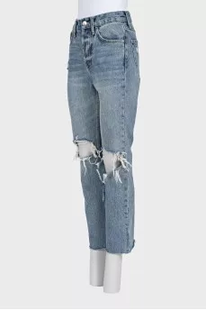 Blue ripped jeans with logo