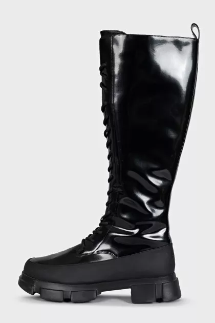 Black patent leather boots with zip and laces
