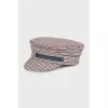 Checkered cap with leather logo